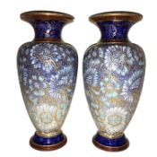 A pair of Doulton Lambeth vases decorated in blues,