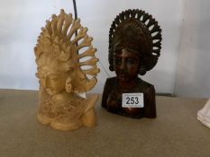 2 carved wood African heads