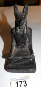 A metal figure of the Egyptian God,