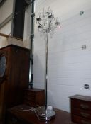A modern standard lamp in the style of a chandelier