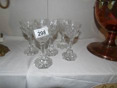 A set of 6 cut glass wine goblets with heavy bases