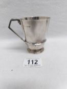 A silver christening mug with engraving, H M Birmingham 1922,