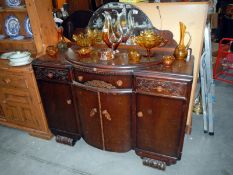 A mirror backed sideboard & a round galleried table