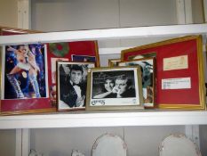 A quantity of signed pictures in frames including The Carpenters