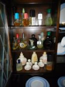 A quantity of perfume bottles (most with contents)