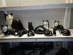 A quantity of cat figures