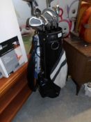 A golf bag and clubs