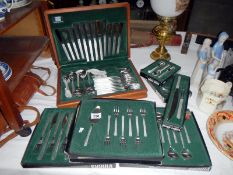 A quantity of boxed Viners studio cutlery