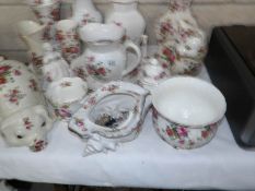 A mixed lot of rose decorated china