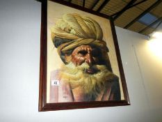 A painting on silk of a bearded man with turban, signed,