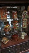 A quantity of cottage ware teapots,