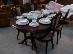 A dining table and 4 chairs