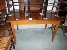 An extending dining table