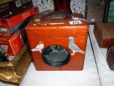 A pigeon racing clock