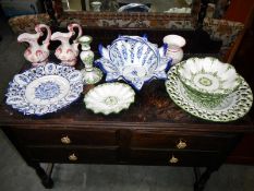 A quantity of hand painted plates etc.
