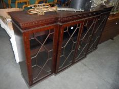 A dark wood stained astragal glazed bookcase