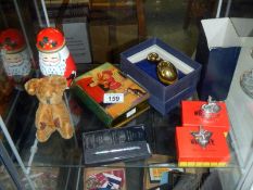 A tin plate money box, 2 Rupert boxed items,