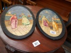 A pair of Bretby plaques of Dutch scenes