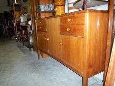 A retro walnut veneered side board