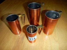 A set of 4 copper measures