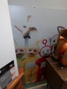 A large Tellytubbies poster