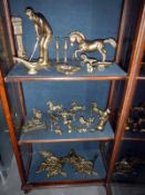 A quantity of brass figures etc.