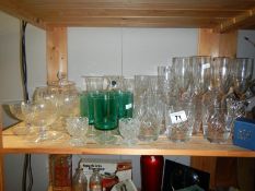 A large quantity of glassware jugs & vases etc.