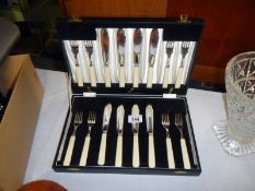 A cased set of fish knives & forks