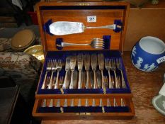 A cased set of silver plate fish knives,