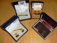 A cufflink & tie pin set,