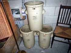 3 large stoneware storage jars.