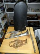 A tenor horn in case,