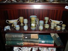 A collection of Wade blue/green pottery (approximately 15 pieces)