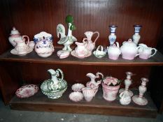 A quantity of Portuguese hand painted teapots,