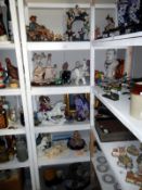 5 shelves of miscellaneous items including figures etc.