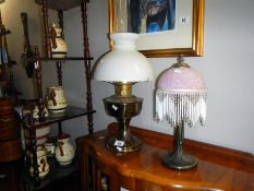 An oil lamp & table lamp