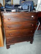 A 4 drawer chest of drawers