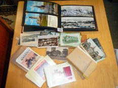 An album of large postcards & old postcards etc.