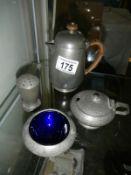 A Tudric 3 piece pewter cruet set with original blue glass liners & a Tudric coffee pot