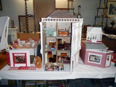 A large dolls house & accessories etc.