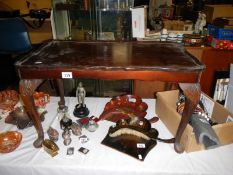 A coffee table with glass insert