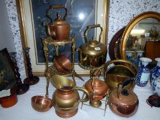 A quantity of copper & brass items including kettles etc.