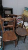 3 odd kitchen chairs and a wooden step ladder
