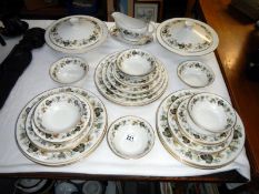 A Royal Doulton dinner service including 2 tureens.