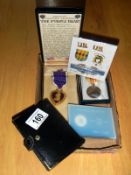 A quantity of replica medals including The Purple Heart