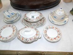 A child's china dinner service and a part child's china tea set