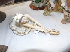 A bisque porcelain ballerina figure