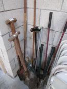 A quantity of shovels and tools