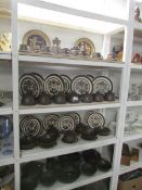 4 shelves of approximately 56 pieces of Denby including Mayflower dinner set and 2 Denby
