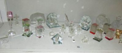 A shelf of glass and other ornaments